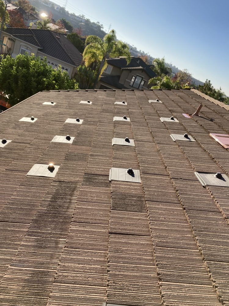 Slide of Venture Roofing