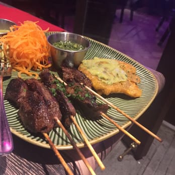Travesias - Pinchos and fried plantains. Lovely presentation. - Latin American Near Me - Bronx, New York Travesias - Pinchos and fried plantains. Lovely presentation. - Latin American Near Me - Bronx, New York
