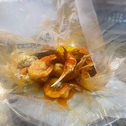 Seafood Boil with Snowcrabs, shrimp, potatoes, sausage, corn, and a boiled egg Seafood Boil with Snowcrabs, shrimp, potatoes, sausage, corn, and a boiled egg