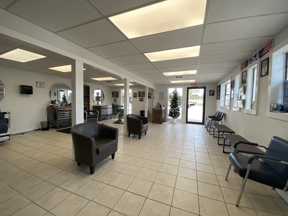 Southpaw Barber Shop Logo