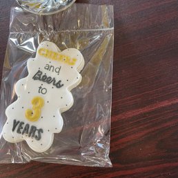 a cookie and a glass of orange juice