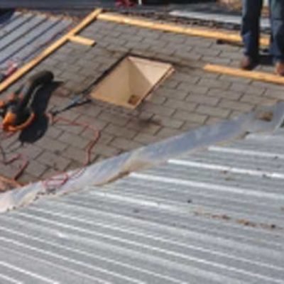 Slide of A Manos Roofing