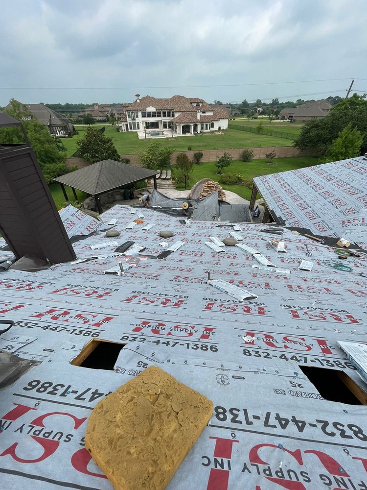 Slide of J&M Roofing Company