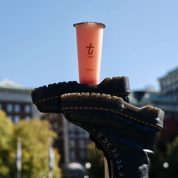 TBaar - Eagan - a hand holding a cup of coffee - Bubble Tea Near Me - Eagan, Minnesota TBaar - Eagan - a hand holding a cup of coffee - Bubble Tea Near Me - Eagan, Minnesota