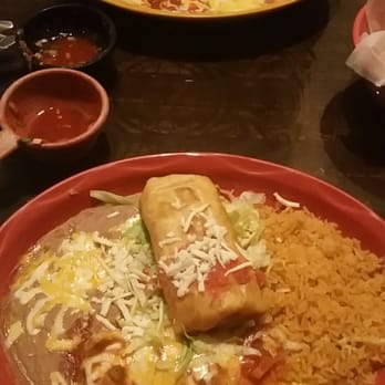 Casa Tequila - Chicken Chimichanga and chili relleno with rice and beans. And a super burrito - Mexican Near Me - Boca Raton, Florida Casa Tequila - Chicken Chimichanga and chili relleno with rice and beans. And a super burrito - Mexican Near Me - Boca Raton, Florida
