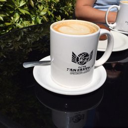 two cups of coffee on a table two cups of coffee on a table
