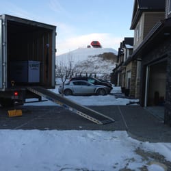 Super Duper Movers - Can see COP WinSport Canada in the background. Working hard while everyone behind us is having fun skiing and snowboarding.