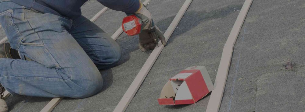 Slide of Two Men Roofing