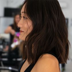 The Co-Artist Studio - Textured lob haircut and soft, dimensional partial highlights on dark hair by Geselle at The Co-Artist Studio in Capitola, CA.