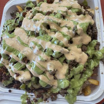 Chino's Mexican Kitchen - Aztec Fries with 1/2 carne asada and 1/2 adobada! - Mexican Near Me - Las Vegas, Nevada Chino's Mexican Kitchen - Aztec Fries with 1/2 carne asada and 1/2 adobada! - Mexican Near Me - Las Vegas, Nevada