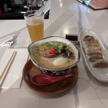 Marufuku Ramen - Tonkotsu Ramen, Pork Gyoza, and a glass of beer on tap. - Ramen Near Me - Austin, Texas Marufuku Ramen - Tonkotsu Ramen, Pork Gyoza, and a glass of beer on tap. - Ramen Near Me - Austin, Texas