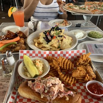 Bourbon Street - Rooftop Wings Housemade Lobster Roll Rooftop Nachos Margherita Pizza Bourbon Street Hurricane - Cajun/Creole Near Me - Bayside, New York