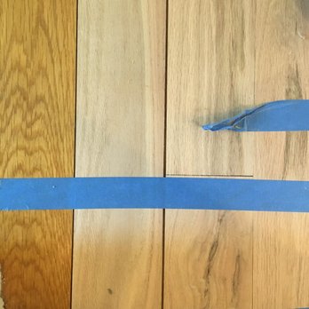 Wimpee's Floor Center Inc - a piece of tape on the floor - Flooring Near Me - Mobile, Alabama