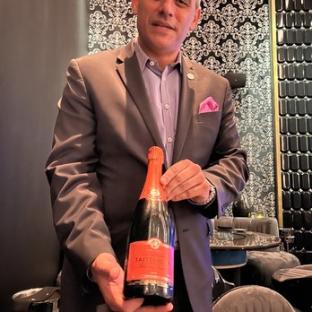 Aqua - Sommelier Brian Browning presenting Taittinger Champagne. - Seafood Near Me - Las Vegas, Nevada Aqua - Sommelier Brian Browning presenting Taittinger Champagne. - Seafood Near Me - Las Vegas, Nevada