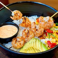 Ram Restaurant & Brewery - Pineapple salsa, avocado, jasmine rice, blackened grilled shrimp, and our signature yum yum sauce.