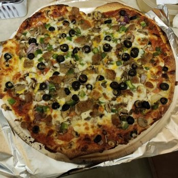 Papa Murphy's - a pizza on a table - Pizza Near Me - Louisville, Kentucky Papa Murphy's - a pizza on a table - Pizza Near Me - Louisville, Kentucky