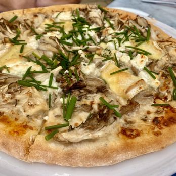 The Bench - Organic Mushroom Flatbread is pretty big to share! - New American Near Me - Pebble Beach, California The Bench - Organic Mushroom Flatbread is pretty big to share! - New American Near Me - Pebble Beach, California