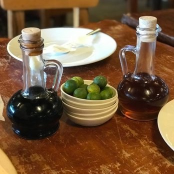 Leslie's Restaurant Tagaytay - Picture of typical condiments in almost every restaurant in the Philippines. Soy sauce, Fish Sauce, Calamansi citrus fruits and Chilis - Filipino Near Me - Tagaytay, CAV Leslie's Restaurant Tagaytay - Picture of typical condiments in almost every restaurant in the Philippines. Soy sauce, Fish Sauce, Calamansi citrus fruits and Chilis - Filipino Near Me - Tagaytay, CAV