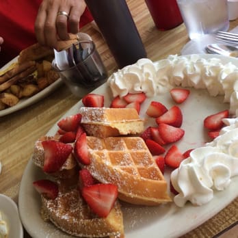 Bertha's Diner - Belgium waffles and in the back my hubbys 3 choice omelet with home fries - Diners Near Me - Buffalo, New York