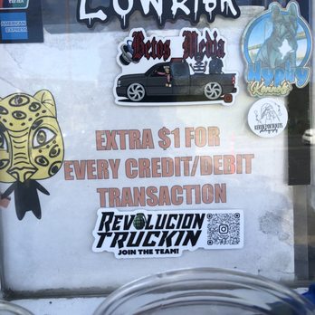 Tacos El Poblanito - Notice of CC/debit fee posted by window - Mexican Near Me - Hayward, California Tacos El Poblanito - Notice of CC/debit fee posted by window - Mexican Near Me - Hayward, California