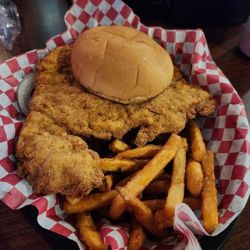 Welcome Inn Bar & Grill - Pork tenderloin. Great breading, well seasoned, hand pounded out... Very easily a  top BPT in Iowa.