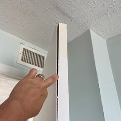 North Shore Realty Incorporated - Doors busted, paint peeling