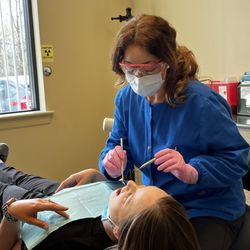 Comfort & Care Dentistry - Staff with patient