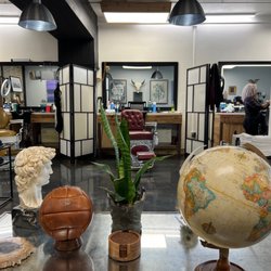Bison Barbers - Inside the shop.   The ambience and aroma is fabulous!