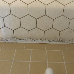 Loose caulk bathroom