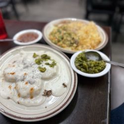 geli's cafe - A Must Do, order biscuits and gravy, a bottle of Tabasco, & a side of long green chilis. Sprinkle green chilies & Tabasco on top.