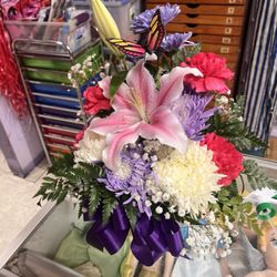 Pulido's Flowers & Gifts - $35 bouquet with cute bucket basket