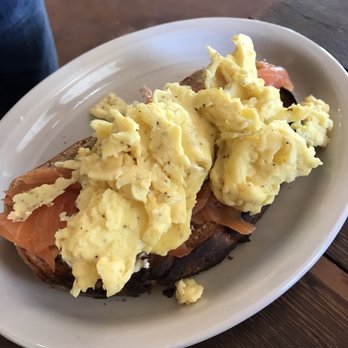 Toast - Fresh baked sour dough bread with salmon, cream cheese, scrambled egg, and capers - Breakfast & Brunch Near Me - New Orleans, Louisiana Toast - Fresh baked sour dough bread with salmon, cream cheese, scrambled egg, and capers - Breakfast & Brunch Near Me - New Orleans, Louisiana