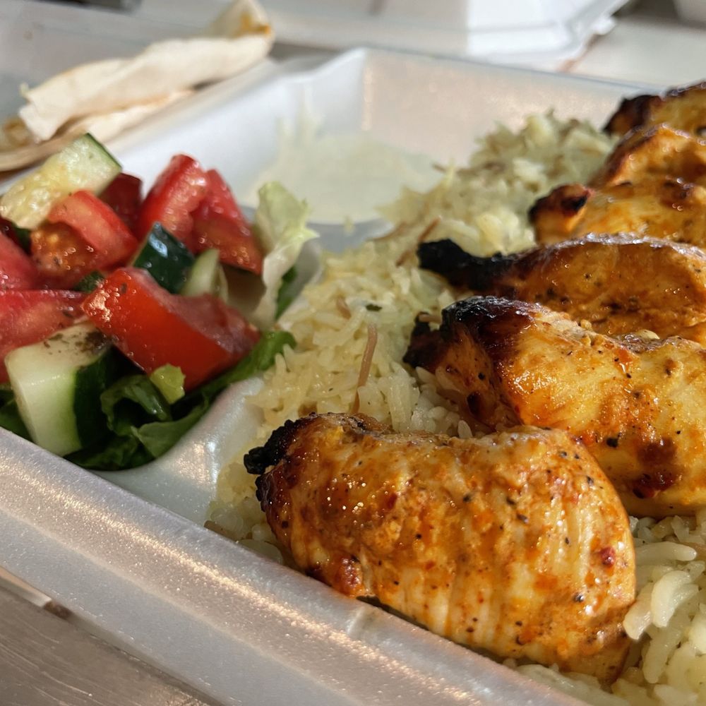 Ararat Market - chicken, rice, and salad in a plastic container - Armenian Near Me - Clovis, California