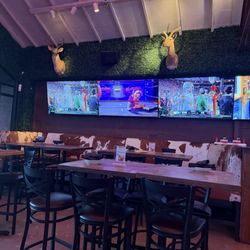 Dudley’s Sports Grill - Dining area behind bar