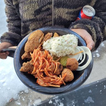 Tj's Bbq & Fish - a person holding a plate of food - Barbeque Near Me - Nashville, Tennessee Tj's Bbq & Fish - a person holding a plate of food - Barbeque Near Me - Nashville, Tennessee