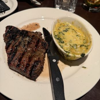 Cherokee Grill - prosperity steak with baked spinach spicy cheese macaroni - Steakhouses Near Me - Gatlinburg, Tennessee Cherokee Grill - prosperity steak with baked spinach spicy cheese macaroni - Steakhouses Near Me - Gatlinburg, Tennessee