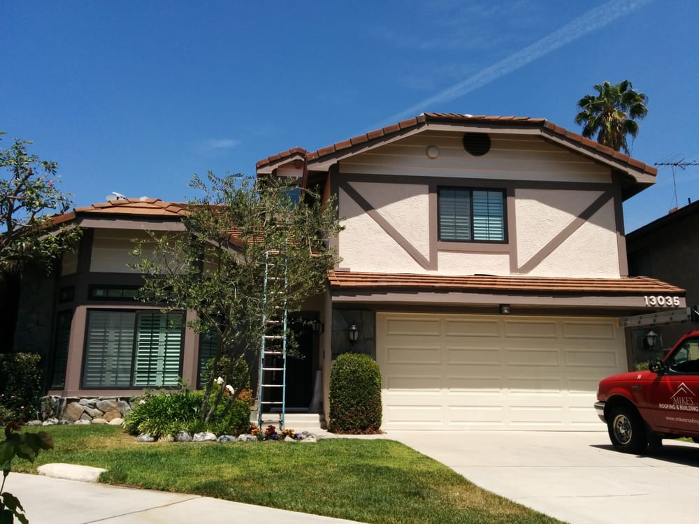 Slide of Mike's Roofing & Building