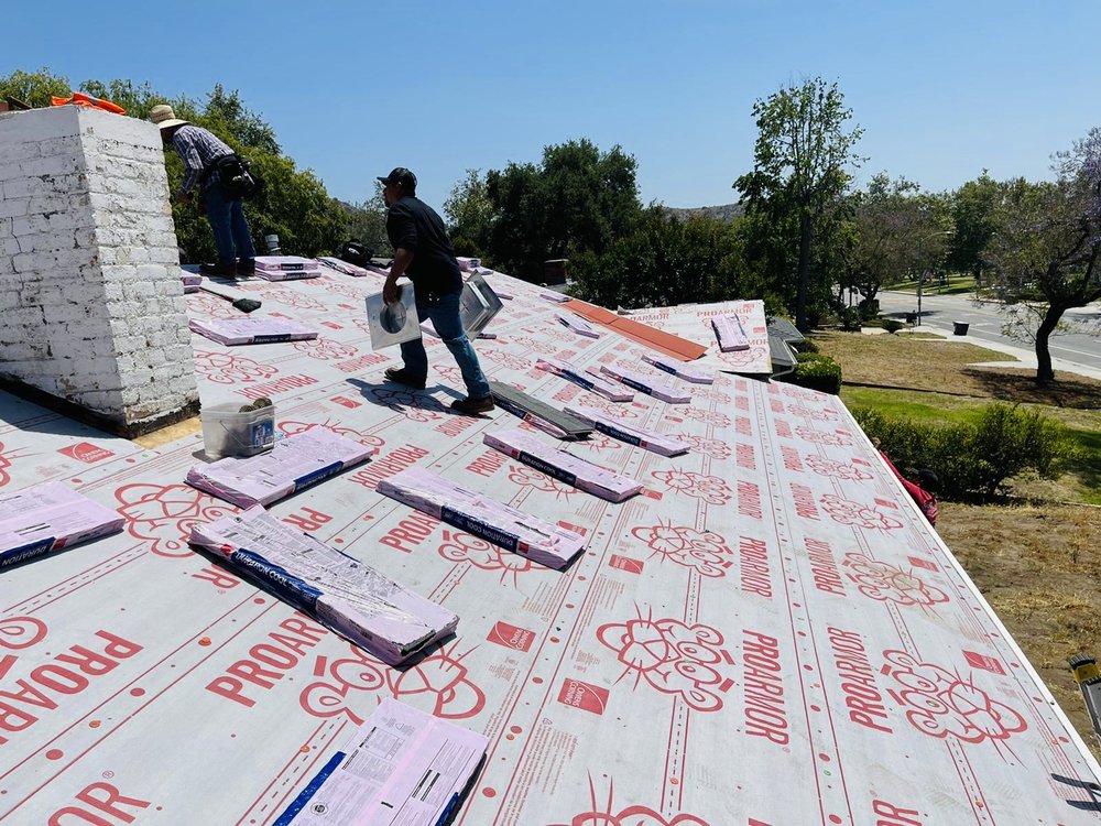 Slide of Almighty Roofing