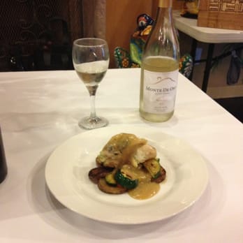 Redhawk Golf Club - Stuffed chicken breast served with a Monte De Oro white wine called Nostimo (Greek for "delicious"). - Golf Near Me - Temecula, California Redhawk Golf Club - Stuffed chicken breast served with a Monte De Oro white wine called Nostimo (Greek for "delicious"). - Golf Near Me - Temecula, California