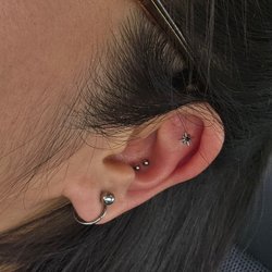 Black Hole Body Piercing - Double Conch and Flat by Josh