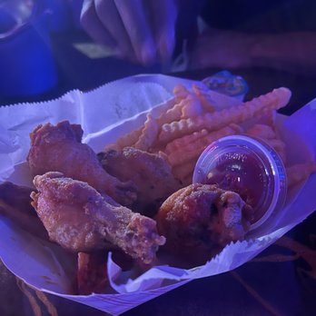 GOLDRUSH Showbar - a basket of fried wings and fries - Strip Clubs Near Me - Atlanta, Georgia