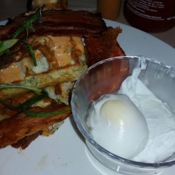 Lady Marmalade - Cheddar spinach waffles with added bacon and poached eggs (clearly my boyfriends :p) - Breakfast & Brunch Near Me - Toronto, Ontario Lady Marmalade - Cheddar spinach waffles with added bacon and poached eggs (clearly my boyfriends :p) - Breakfast & Brunch Near Me - Toronto, Ontario