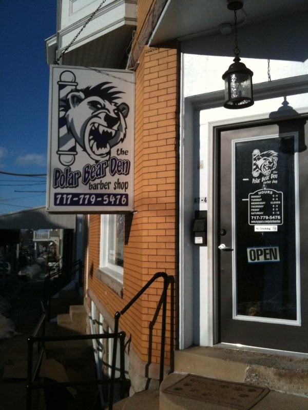 The Polar Bear Den Barber Shop Logo