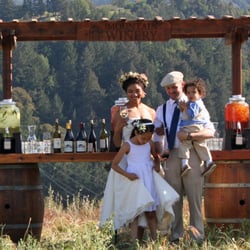 ReWINEd Designs - Rustic décor Wine Barrel Arbor Bar created by reWINEd designs. Available to rent at any location or venue.
