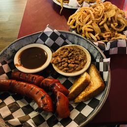 a plate of hot dogs and french fries a plate of hot dogs and french fries