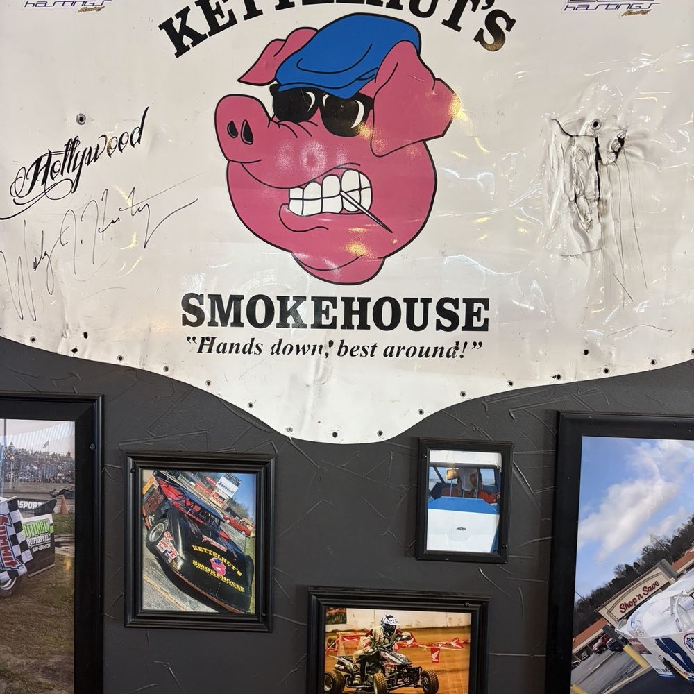 Kettelhut's Smokehouse - Emblem of smokehouse which was used for a hood of a sponsored dirt track race car. - Smokehouse Near Me - Crystal City, Missouri Kettelhut's Smokehouse - Emblem of smokehouse which was used for a hood of a sponsored dirt track race car. - Smokehouse Near Me - Crystal City, Missouri