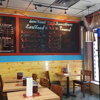 Seafood Junction - the menu on the wall of the restaurant - Seafood Near Me - Oak Park, Illinois
