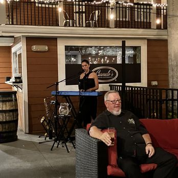 Carmelo's - The soloist with her player piano with the seating area in front for her enthusiasts - Italian Near Me - Punta Gorda, Florida