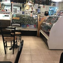 This place is so cute the food the desert and they even have Greek beer