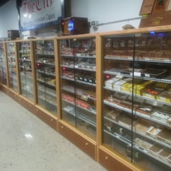 The City Tobacco & Beverage Center - Six Premium Cigar Humidor cabinets. 24 ft. of climate controlled Cigars.